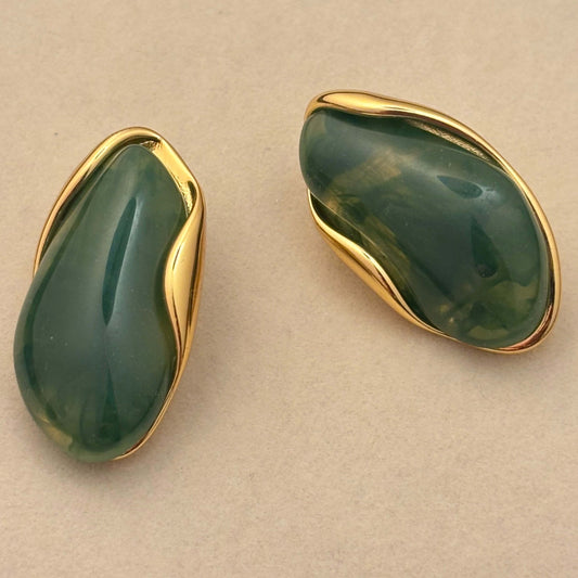 Green resin teardrop earrings with gold-tone rim, side view, set of two