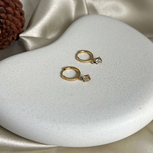 Gold hoop drop earrings with crystal accent, shown as a pair
