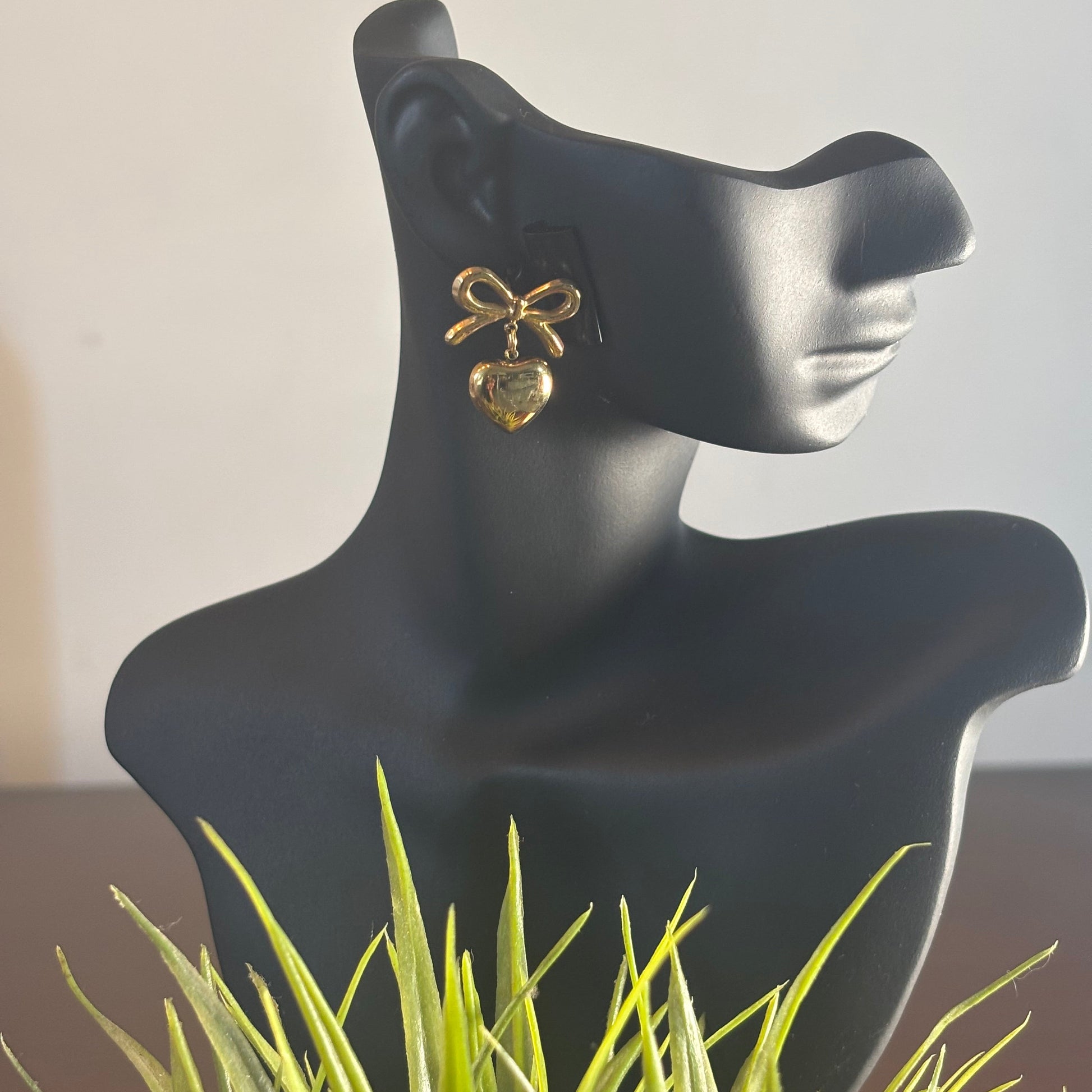 Gold bow and heart drop earrings with small heart charm
