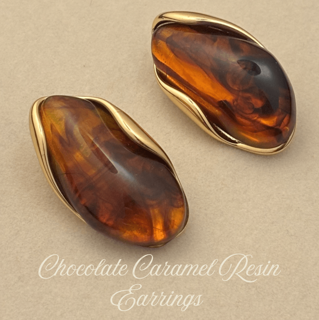 Teardrop resin earrings with glossy caramel amber and chocolate-brown marbling, gold rims